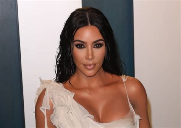 Kim Kardashian in Bathing Suit Has “Beach Party” — Celebwell