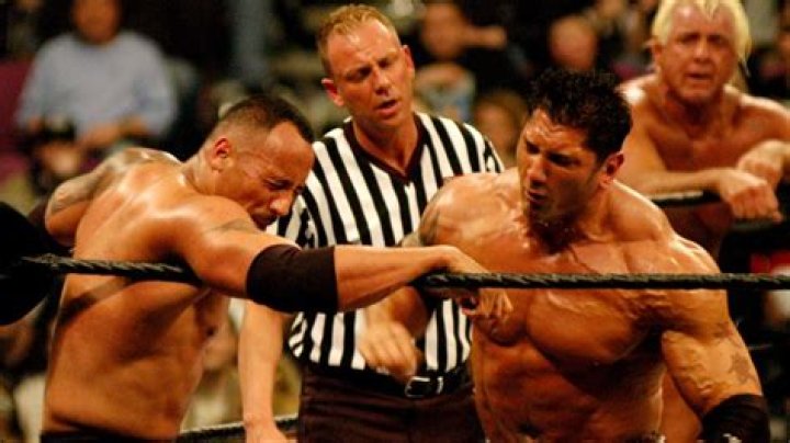 Who had more wins in the ring, Dave Bautista or Dwayne Johnson?